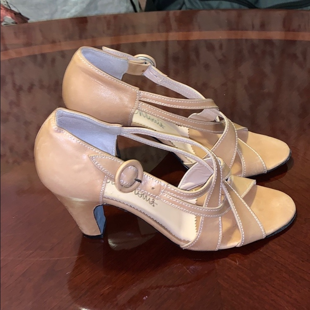 Olivia Morris's nude open shoes are pre-worn. Heel 3in high.